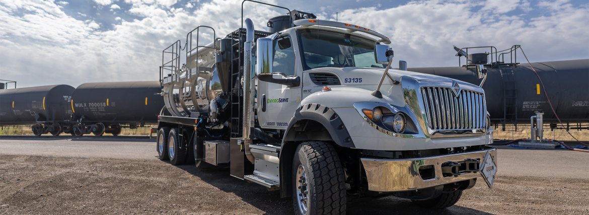 pictured: an EnviroServe truck parked outside in daylight